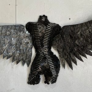 Enchanting Wings: Handcrafted Metal Female Torso with Captivating Chain Wings